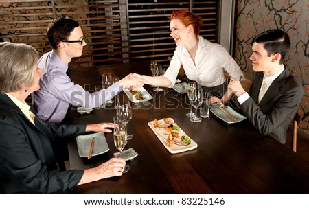 Four people people meeting for lunch