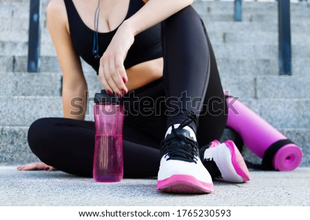Similar – Image, Stock Photo Water bottle on pink background close-up