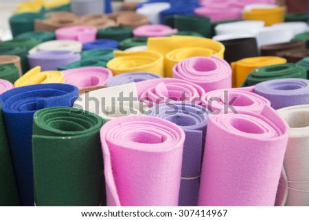 Rolls of felt fabric in multiple colors