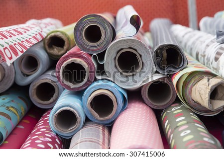 Rolls of fabric on a table at fabric market