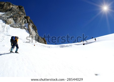 Group of climbers goes out on a mountain  pass
