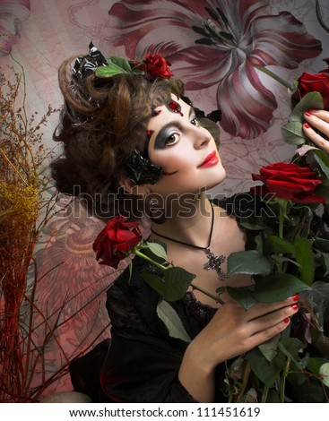 Spanish woman. Young woman in dramatic artistic image with rose's and skull