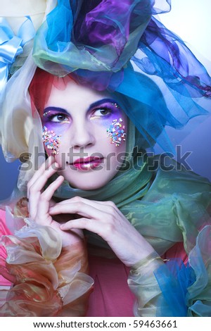 Romantic portrait of young lady with bright make-up. Doll style.