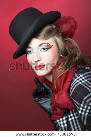 Young woman in vintage hat, checkered plaid and gloves.