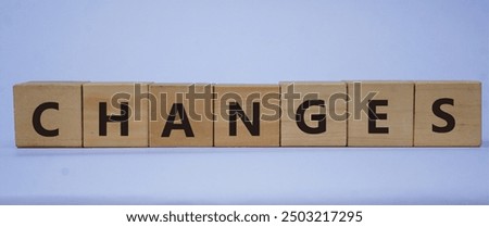 Similar – Image, Stock Photo Businessman with wooden blocks and red arrow