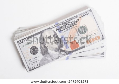 Similar – Image, Stock Photo Dollar banknotes on a wooden table