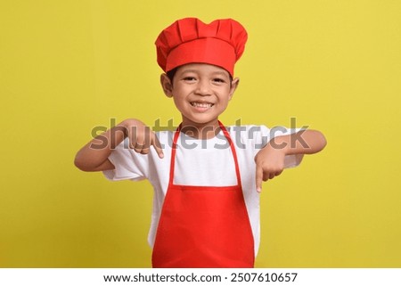 Similar – Image, Stock Photo Smiling boy in apron in kitchen