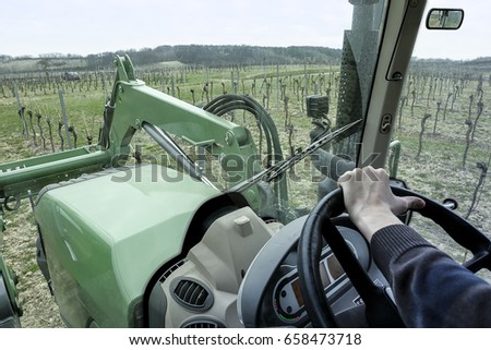 Image, Stock Photo Winemaker driving garden tractor in vineyards in summer