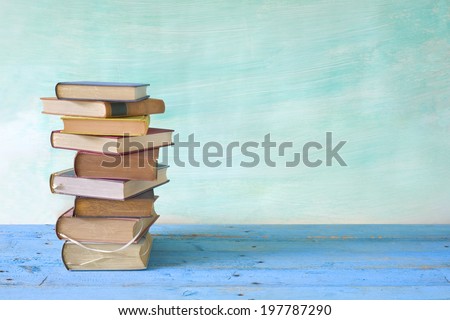 stack of books, grungy background,free copy space