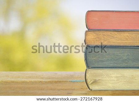 stack of books, nature background,free copy space