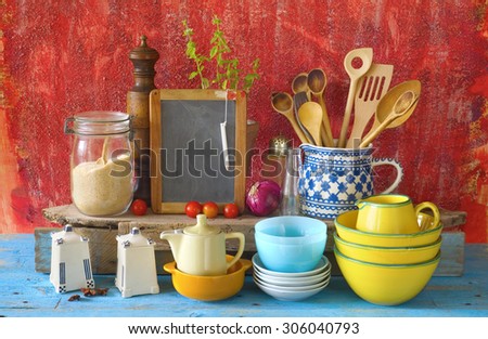 collection of vintage kitchenware, red old kitchen wall  background
