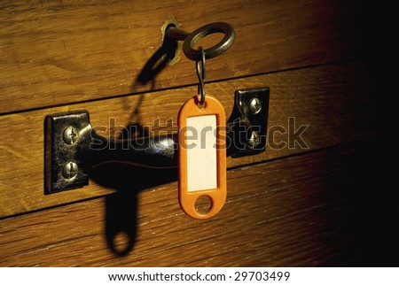 old desk locker with key and hanger, free copy space, grunge