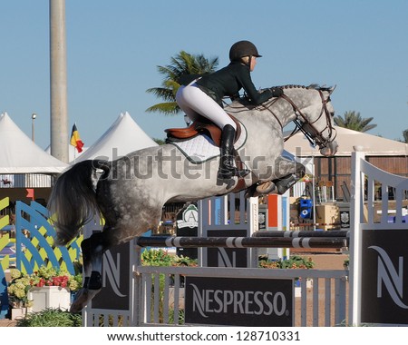 WELLINGTON, FLORIDA - FEBRUARY 17:Lillie Keenan & Pumped Up Kicks compete at WEF 6 in the Griffis Residential High Junior 11.2.a class and took 3rd place February 17, 2013 in Wellington, Florida.