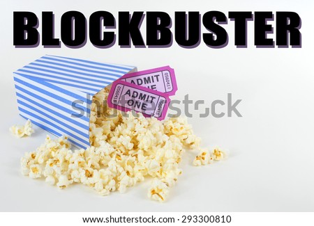 Summer movie theme with a blue and white striped bucket full of popcorn and two purple movie tickets. Popcorn is scattered about white background. Removable summer blockbuster movie text