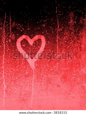 Bleeding heart shape in pink on grungy black fading to red background that looks like tears running. Vertical image with copy space would be great concept for broken heart or unrequited love.