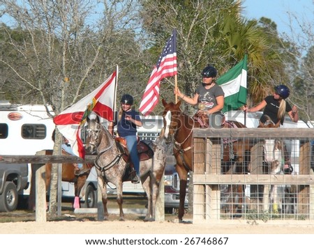 WEST PALM BEACH, FLORIDA - MARCH 14: Color guards prepare for ceremony at the Palm Beach Mounted Posse Barrel Point show on March 14, 2009 in West Palm Beach, Florida.