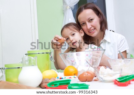 helping to mother in the kitchen
