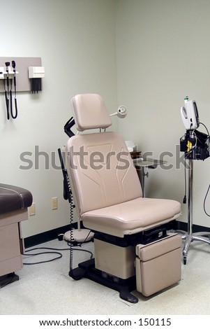 GYN chair in exam room at medical doctor's office