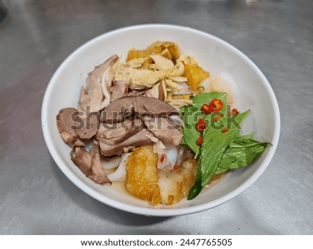 Similar – Image, Stock Photo Banh Uot Long Ga, unique vietnamese dry rice noodles (flat and wide like wet rice cake noodle) dish mixed with herbs and meat, a local delicacy of Da lat Vietnam