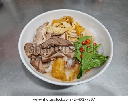 Image, Stock Photo Banh Uot Long Ga, unique vietnamese dry rice noodles (flat and wide like wet rice cake noodle) dish mixed with herbs and meat, a local delicacy of Da lat Vietnam