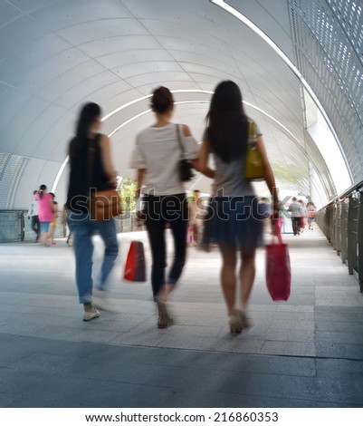 Chinese woman shopping walking