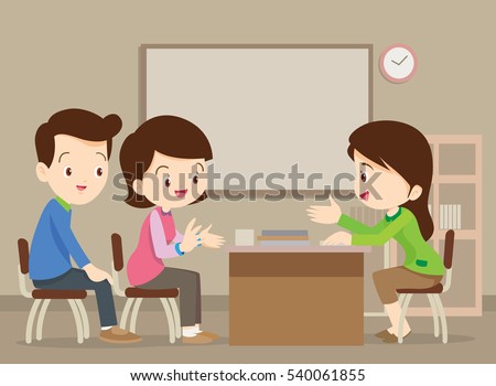 Parent meeting with teacher in classroom.School principal talking to father and mother.