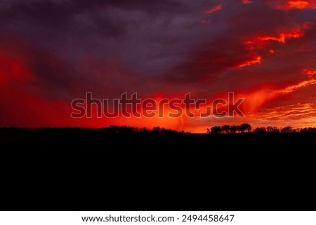 Similar – Image, Stock Photo Dramatic sunset over a pristine landscape with an approaching storm from the north over part of Beskydy mountains, czech republic