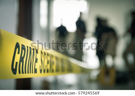 crime scene tape with blurred forensic law enforcement background in cinematic tone and copy space 商業照片 © 
