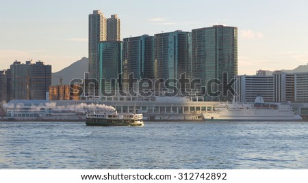 Ferry Solar star leaving Kowloon pier on July 31, 2015 in Hong Kong, China. Ferry is in operation for over 120 years and is one main tourist