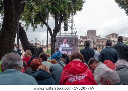 ROME, ITALY - APRIL 27, 2014: The crowd at Holy Mass of canonization of Pope John Paul II and Pope John XXIII. At the castle Angel. Rome, Italy.