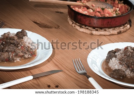 In Polish cuisine, on the Polish table. Beef goulash with groats and carrots.