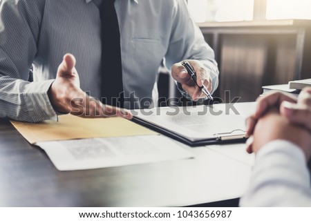 Businessman and Male lawyer or judge consult having team meeting with client, Law and Legal services concept. ストックフォト © 