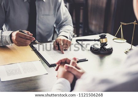 Customer service good cooperation, Consultation between a Businessman and Male lawyer or judge consult having team meeting with client, Law and Legal services concept. 商業照片 © 