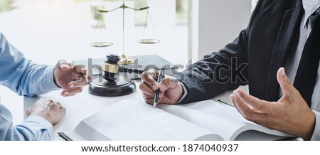 Consultation and conference of Male lawyers and professional businesswoman working and discussion having at law firm in office. Concepts of law, Judge gavel with scales of justice. Foto d'archivio © 