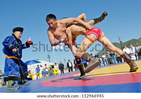 ULAN-UDE, RUSSIA - SEPTEMBER 15: Cultural program of the Baltic Economic Forum. Show of young athletes in the national struggle \