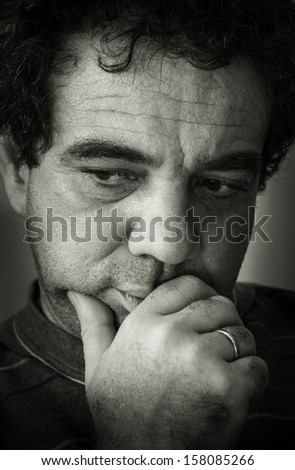 Thoughtful man. Black and white portrait
