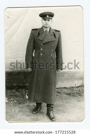 CEGLED, HUNGARY - CIRCA 1950: An antique photo shows studio portrait of a Red Army officer, tank mechanic.