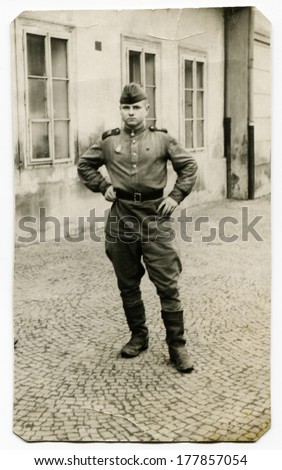 AUSTRIA - CIRCA 1945: An antique photo shows studio portrait of a Red Army officer, tank mechanic.