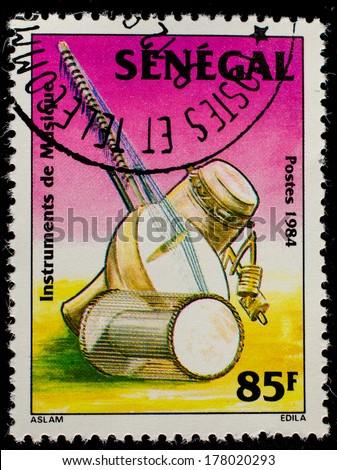 SENEGAL - CIRCA 1985: A stamp printed by Senegal, shows Drums, stringed instrument, circa 1985