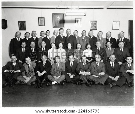 USA- CIRCA 1950s: Vintage photo shows group portrait offfice staff.