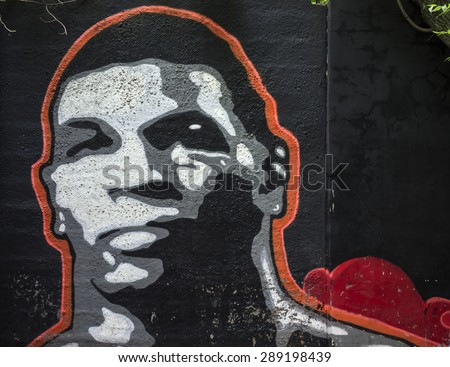 MOSCOW - JUNE 21, 2015: Graffiti on a urban wall (near B. Novodmitrovskaya street). Mike Tyson portrait.