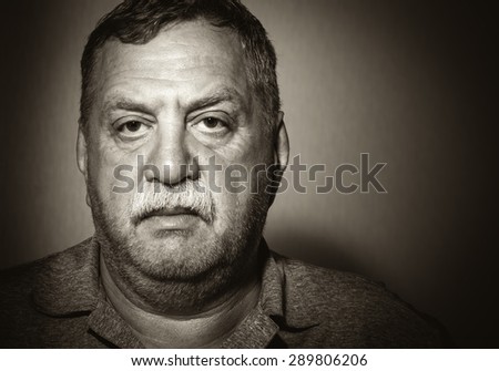 Mature mustached man. Black and white portrait