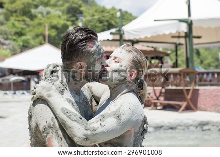 SULTANIYE, TURKEY - JULY 05, 2015: People are taking a mud bath and kiss