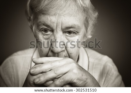 Senior woman pensive and worried. Black and white photo