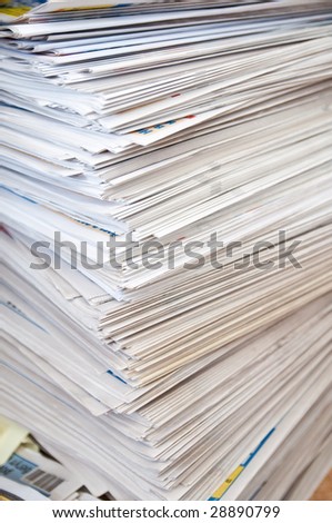 Large number of newspapers, folded in a stack