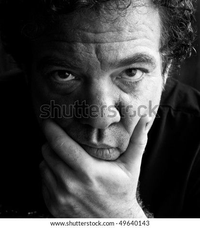 Thoughtful man. Black and white portrait