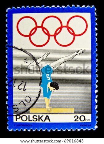 POLAND - CIRCA 1969: A stamp printed in Poland shows gymnast on parallel bars, circa 1969