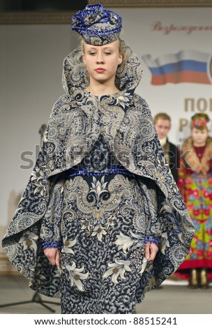 MOSCOW - NOVEMBER 10: Model walks the runway during Fashion Show by Young Russian fashion designers at opening of an exhibition \