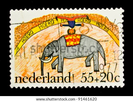 NETHERLANDS - CIRCA 1977: A stamp printed in the Netherlands shows acrobat on an elephant - a child\'s drawing, circa 1977