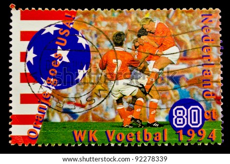 USA - CIRCA 1994: A post stamp printed in USA shows football player, devoted football world championship,USA, circa 1994.